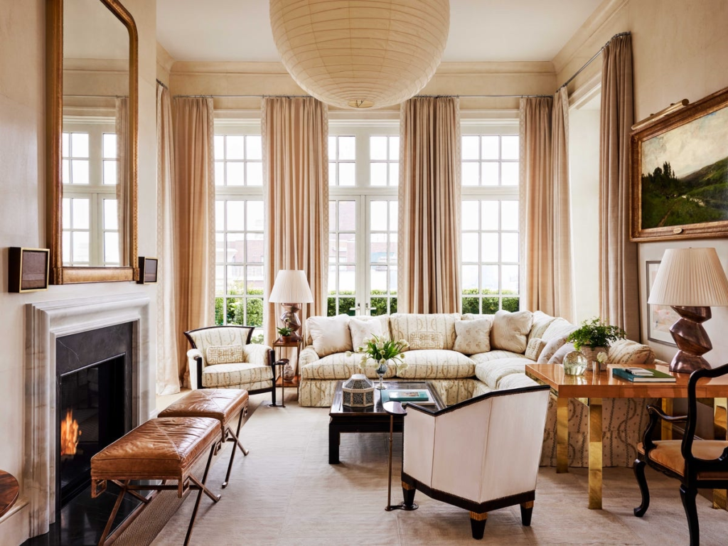 Timeless interior design living room with warm neutral tones, natural materials, and soft lighting