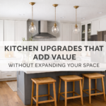 Modern small kitchen featuring smart kitchen upgrades that add value without expanding your space, including white cabinets, quartz countertops, pendant lighting, and functional island seating